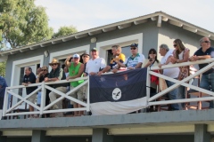 Supporters watching from the clubhouse