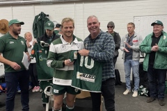 Jode Roach of Allied Newcastle handing jersey to Sam Bright